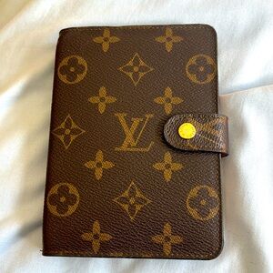 Beautiful classic three ring address book. About 5 x 4.5 inches. Never used!